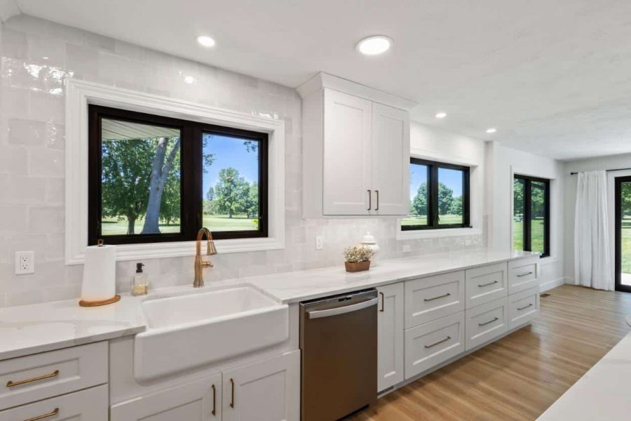 luxury kitchen with farm sink and custom cabinets