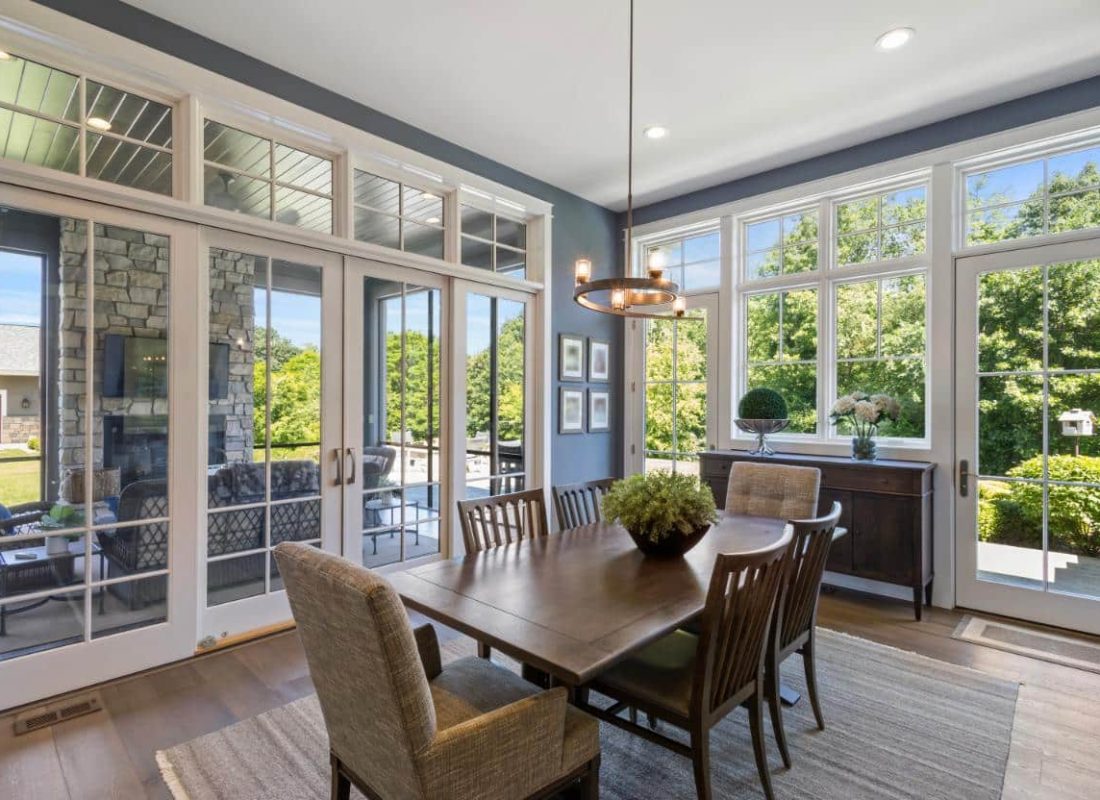 modern dining area with a lot of windows